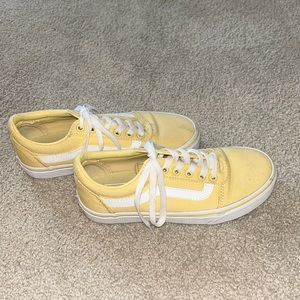 Woman’s yellow vans